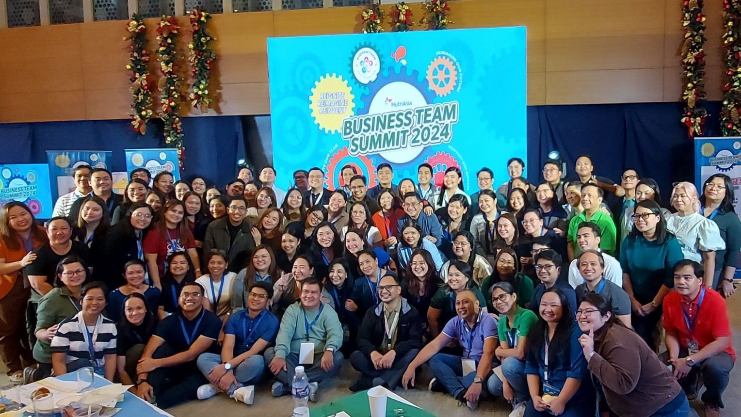 Large group photo at a NutriAsia Business Team Summit 2024 event