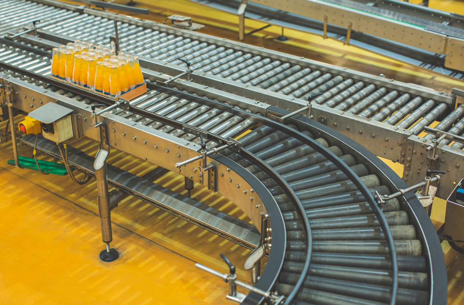 Automated packaging line moving products along a factory conveyor