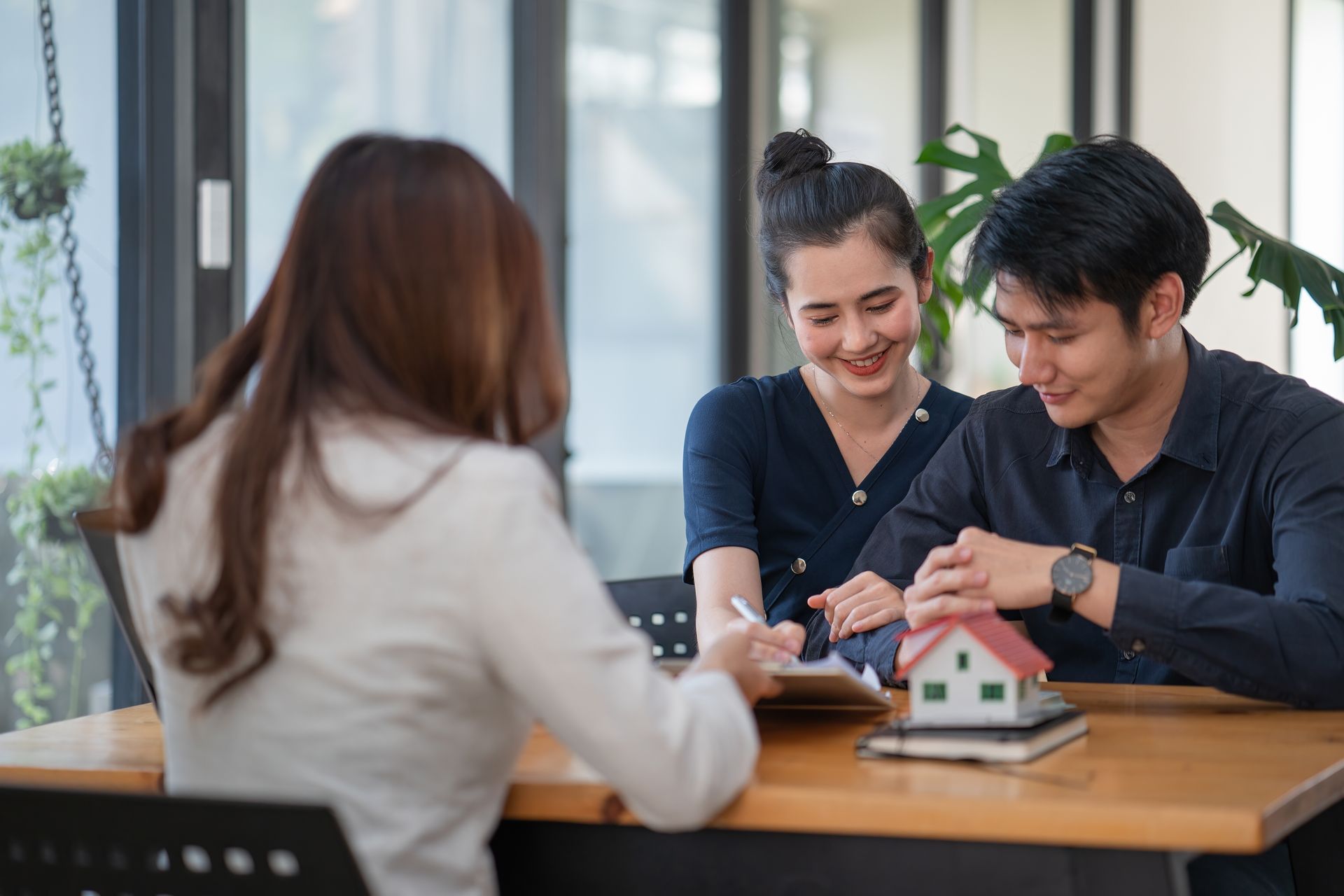 BPI bank branch interior with staff assisting customers at the counter
