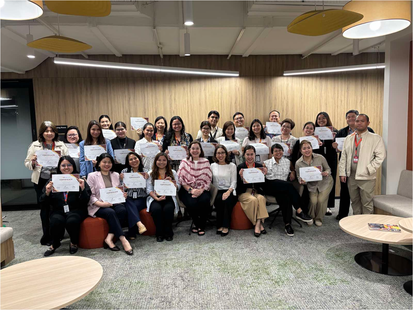 Group picture of Acumen faculty and BPI marketing team members