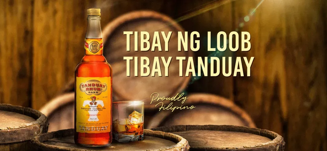 Tanduay rum bottle and glass with "Tibay ng Loob, Tibay Tanduay" branding